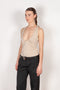 The Deep Cut Tank Top by Coperni is a fitted tank top with a deep cut at the front