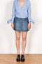 The Denim Cargo Skirt by Coperni are low waisted mini skirts with a signature cargo details