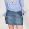 The Denim Cargo Skirt by Coperni are low waisted mini skirts with a signature cargo details