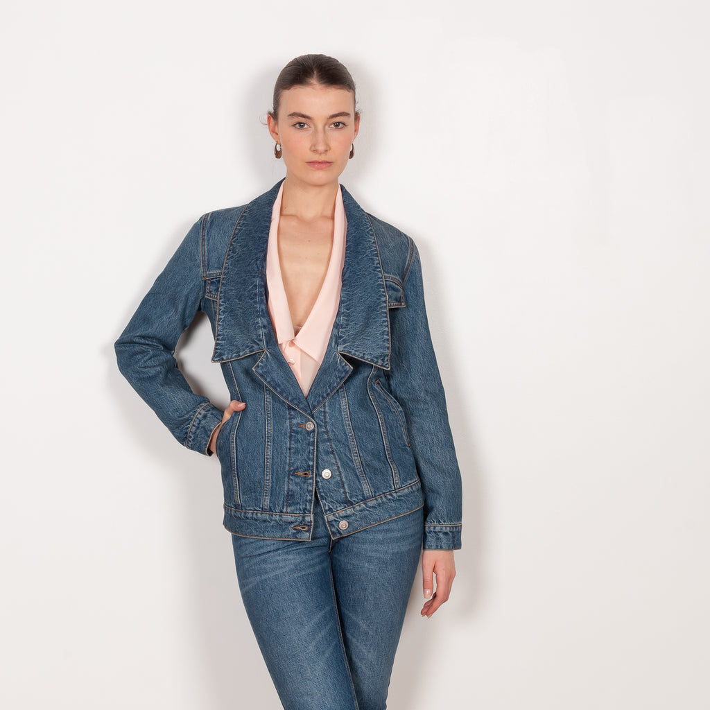 The Denim Jacket by Coperni is a take on the classic denim jacket with a deep open collar