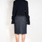 The Faux Fur Hybrid Denim Skirt by Coperni is a denim skirt with an optic low waist and faux fur waistband at the front