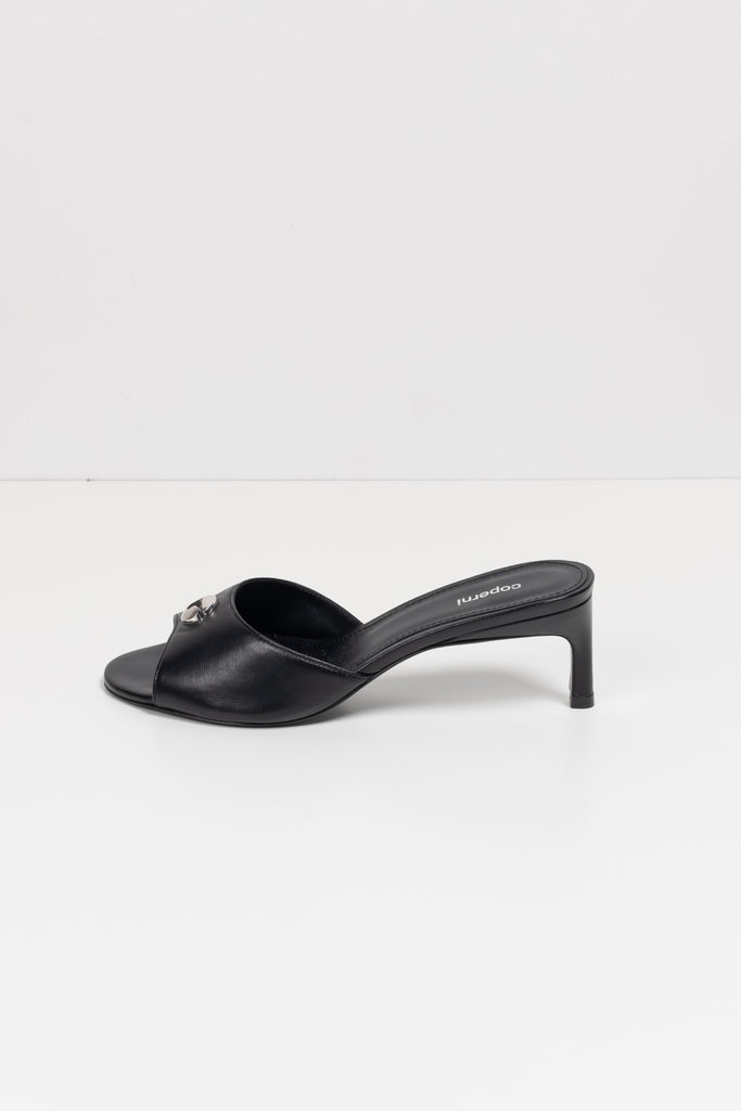 The Low Logo Mule by Coperni is a signature mule with a kitten heel and a Coperni Logo&nbsp;