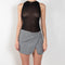 The Triangle Body by Coperni is a fine jersey body with a triangle cut-out at the back