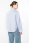 The Cropped Shirt By Denimist is a boxy loose cotton button up shirt with a blue stripe