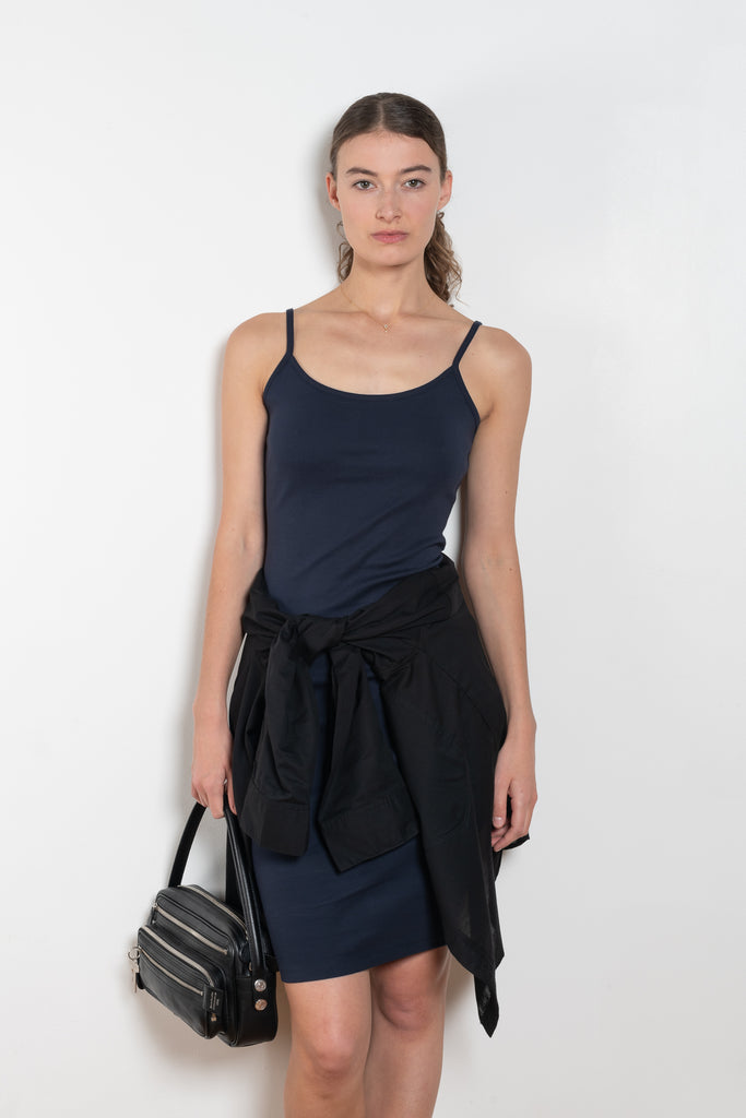 The Bibi Dress by Flore Flore is a fitted camisole dress with a round neck a square backline.