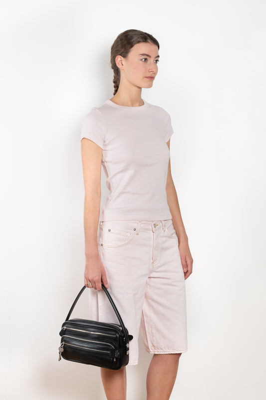 The Car Baby Tee is a fitted t-shirt with a short sleeve. This classic silhouette comes with a double stitched cut-off seam on the back.