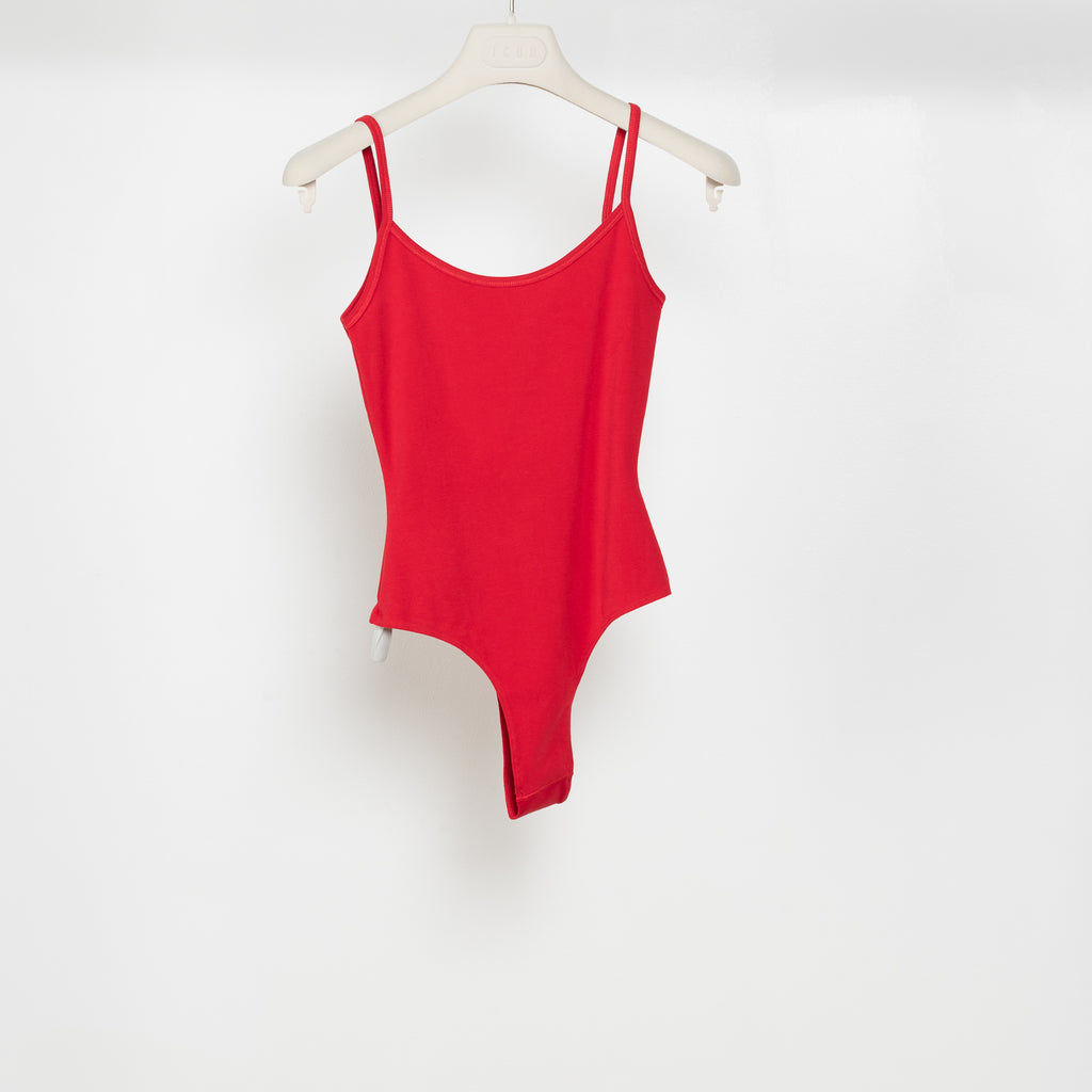 The Carli Body is a camisole thong bodysuit with a scoop neckline and low back