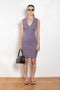 The Dewi Dress by Flore Flore is a fitted crew neck tank dress with a double stitched cut-off seam on the back.