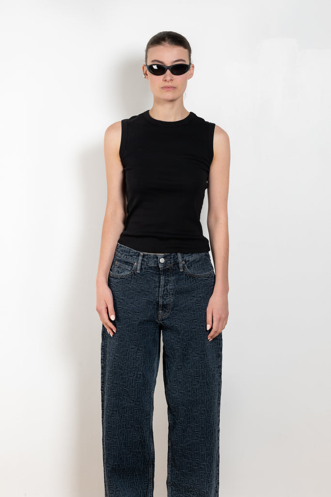 The Esme Tank by Flore Floreis a fitted crew neck tank top with a double stitched cut-off seam on the back