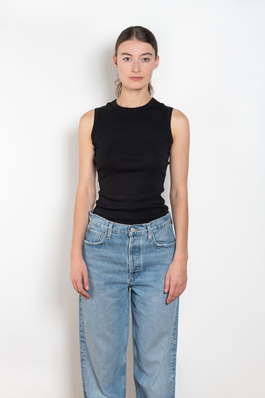 The Esme Tank by Flore Flore is a fitted crew neck tank top with a double stitched cut-off seam on the back. 