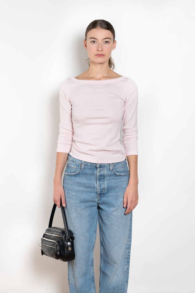 The Steffi Tee by Flore Flore is a classic boat neck tee with a 3/4 sleeve with a double stitched cut-off seam on the back