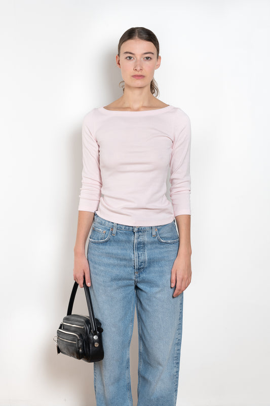 The Steffi Tee by Flore Flore is a classic boat neck tee with a 3/4 sleeve with a double stitched cut-off seam on the back