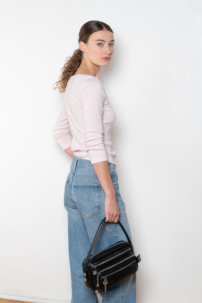 The Steffi Tee by Flore Flore is a classic boat neck tee with a 3/4 sleeve with a double stitched cut-off seam on the back