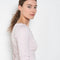The Steffi Tee by Flore Flore is a classic boat neck tee with a 3/4 sleeve with a double stitched cut-off seam on the back