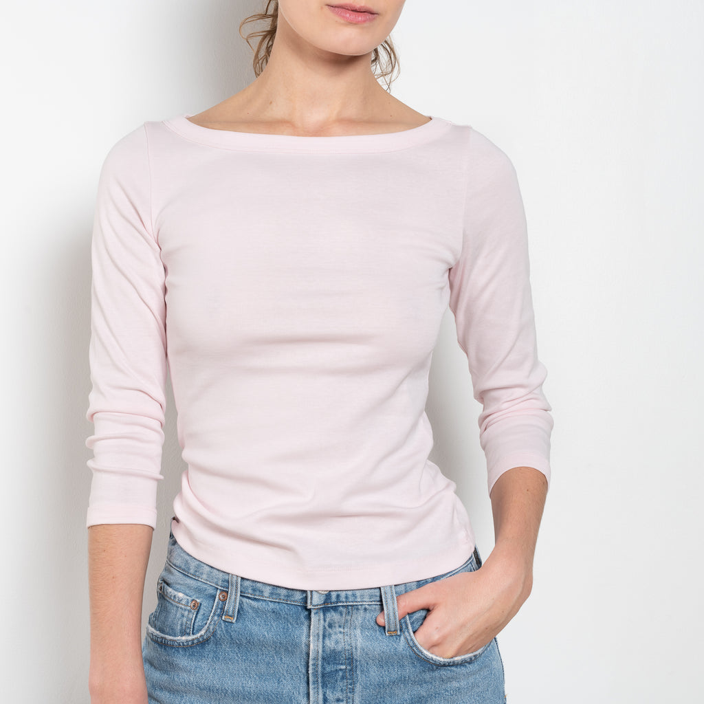 The Steffi Tee by Flore Flore is a classic boat neck tee with a 3/4 sleeve with a double stitched cut-off seam on the back