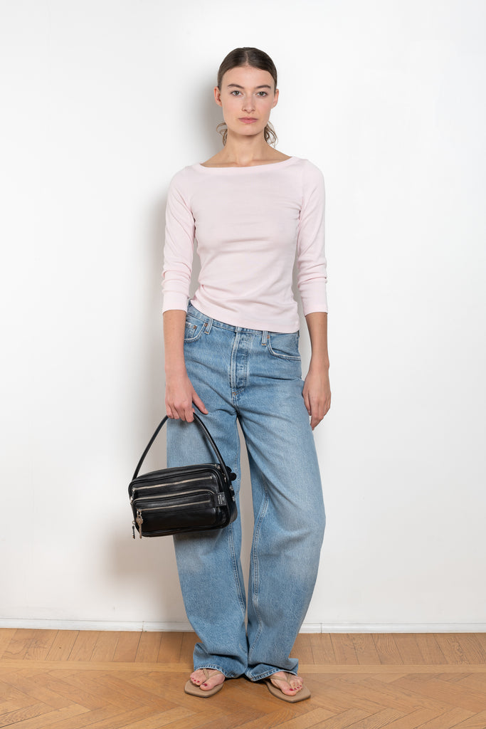 The Steffi Tee by Flore Flore is a classic boat neck tee with a 3/4 sleeve with a double stitched cut-off seam on the back