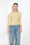 The Steffi Tee by Flore Flore is a classic boat neck tee with a 3/4 sleeve with a double stitched cut-off seam on the back