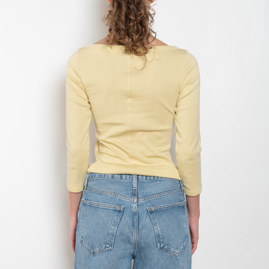 The Steffi Tee by Flore Flore is a classic boat neck tee with a 3/4 sleeve with a double stitched cut-off seam on the back