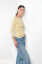 The Steffi Tee by Flore Flore is a classic boat neck tee with a 3/4 sleeve with a double stitched cut-off seam on the back