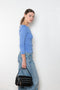 The Steffi Tee by Flore Flore is a classic boat neck tee with a 3/4 sleeve with a double stitched cut-off seam on the back