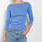 The Steffi Tee by Flore Flore is a classic boat neck tee with a 3/4 sleeve with a double stitched cut-off seam on the back