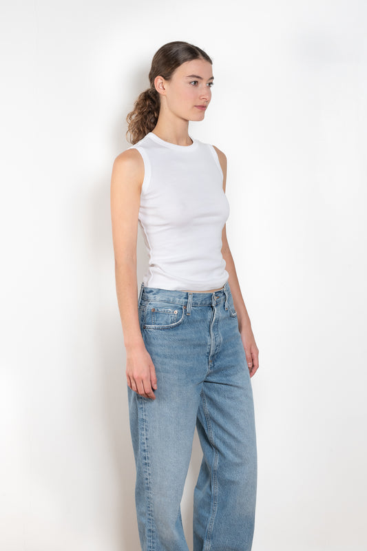 The Esme Tank by Flore Flore is a fitted crew neck tank top with a double stitched cut-off seam on the back. 