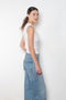 The Esme Tank by Flore Flore is a fitted crew neck tank top with a double stitched cut-off seam on the back.