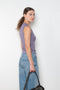 The Esme Tank by Flore Flore is a fitted crew neck tank top with a double stitched cut-off seam on the back