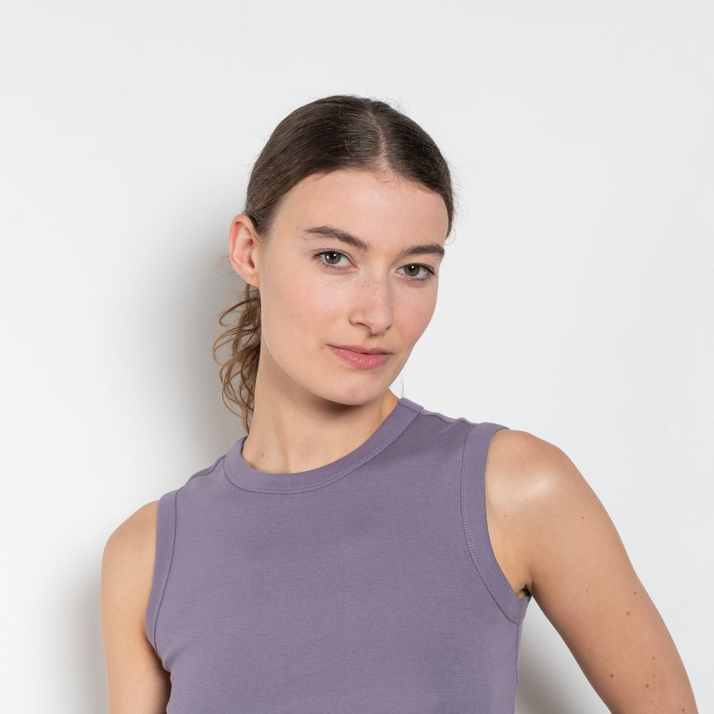 The Esme Tank by Flore Flore is a fitted crew neck tank top with a double stitched cut-off seam on the back