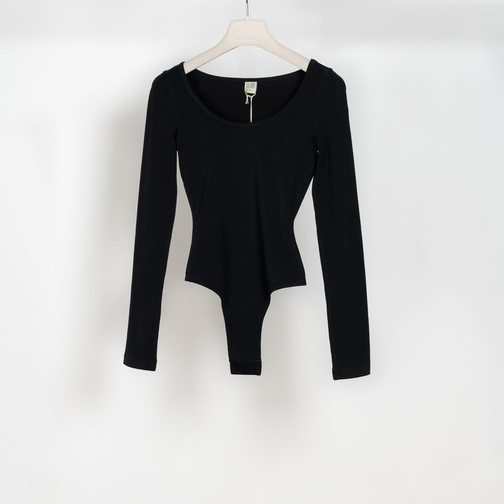 The Yoli Body by Flore Flore is a round neck long-sleeve thong bodysuit