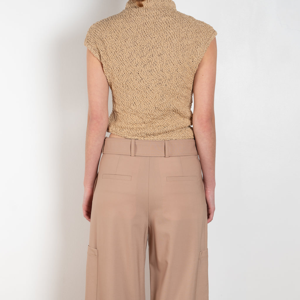 The Trouser M0351 by GAUCHERE is a mid waist suiting trouser with a wide leg and cargo detail