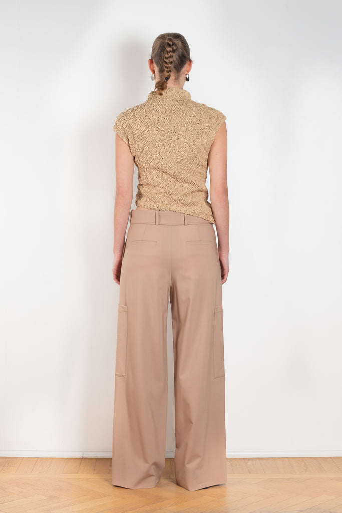 The Trouser M0351 by GAUCHERE is a mid waist suiting trouser with a wide leg and cargo detail