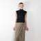 The Paita Long Skirt by Gauge81 is a maxi length wrap skirt with a zip closure in silk