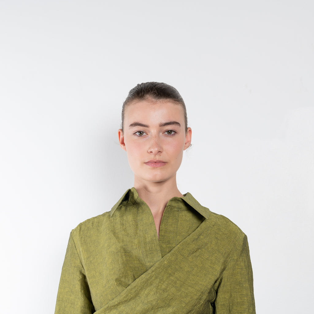 The Sabinas Weave Shirt is a wrap shirt with a short front and longer back piece