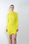 The Ula Dress by Gauge81 is an elegant vibrant yellow dress with draped details in a fine mesh fabric