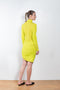 The Ula Dress by Gauge81 is an elegant vibrant yellow dress with draped details in a fine mesh fabric