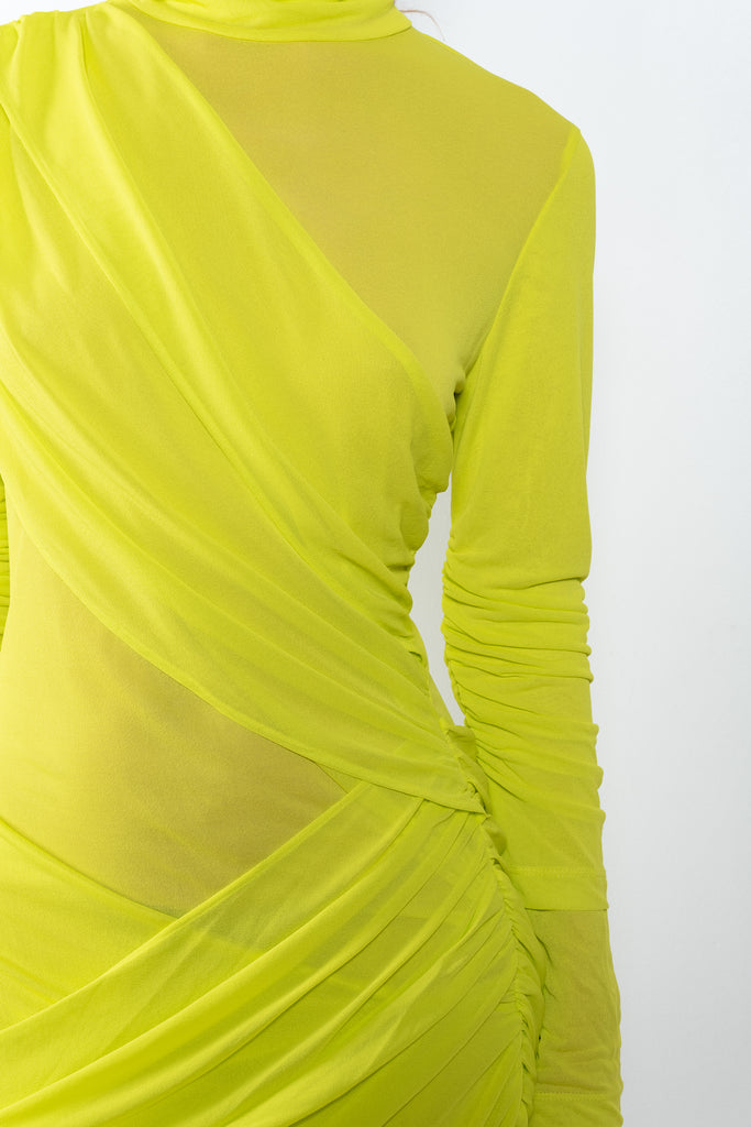 The Ula Dress by Gauge81 is an elegant vibrant yellow dress with draped details in a fine mesh fabric