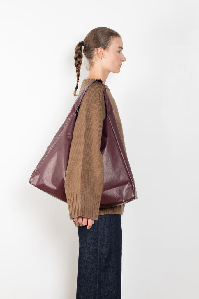 The Tote Shoulder Oil by Kassl Editions is crafted from the signature oil coated cotton-blend