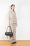 The Annalike Cardigan Jacket by Lisa Yang is a cardigan vest in a fisherman ribbed cashmere with a shawl-neck collar