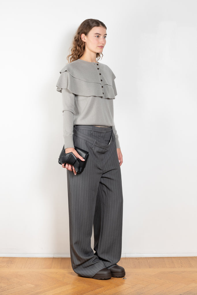 The Aubrey Sweater by Lisa Yang is a feminine cardigan top with a big ruffle detail collar