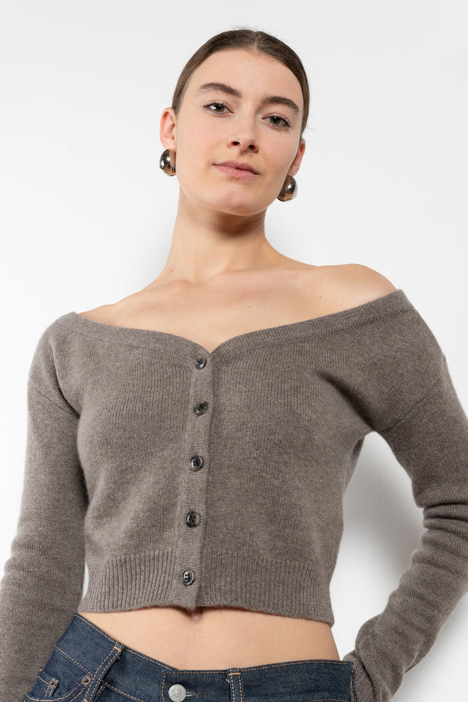 The Beata cardigan by LISA YANG is an off-the-shoulder cashmere cardigan with a cropped fitted silhouette