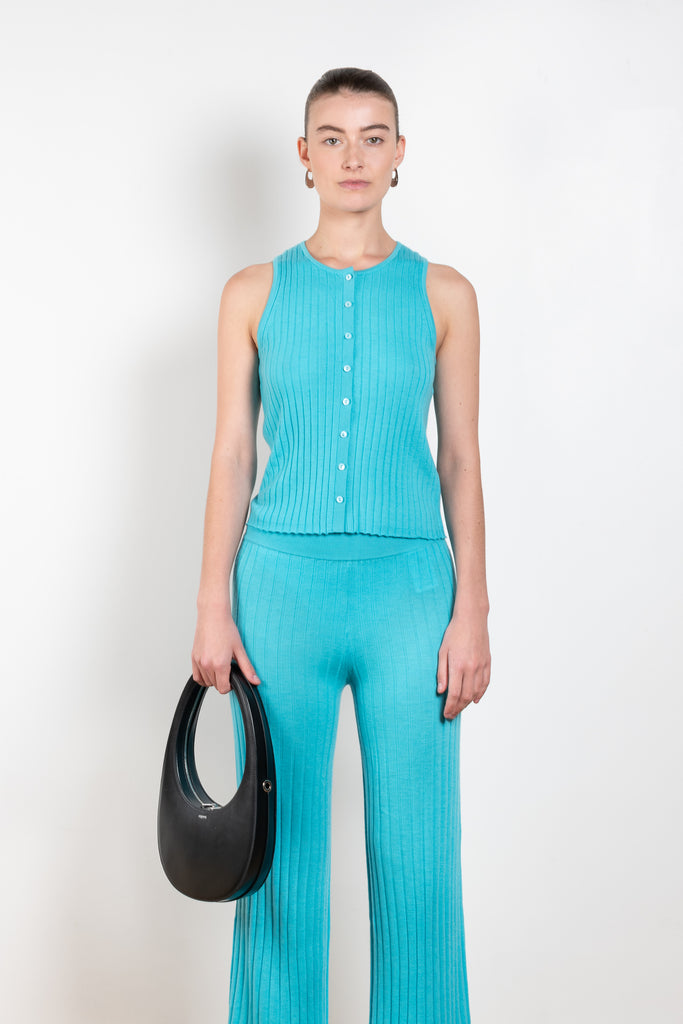 The Cameron Top by Lisa Yang is a buttoned top in a fine draped ribbed cashmere