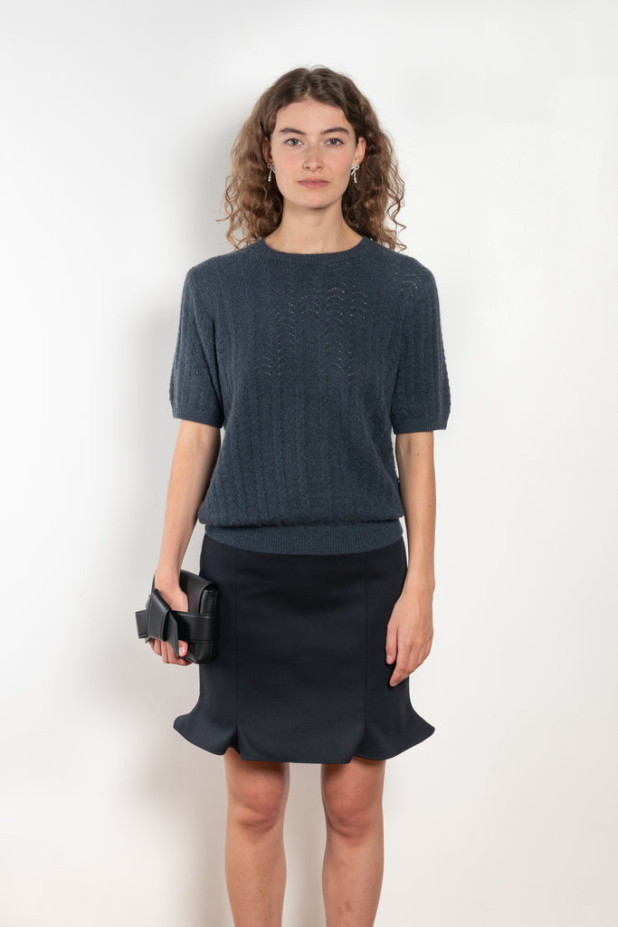 The Cecelia Pointelle Sweater by Lisa Yang is a fine knit cashmere top with a round neck and pointelle detailing