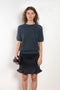 The Cecelia Pointelle Sweater by Lisa Yang is a fine knit cashmere top with a round neck and pointelle detailing
