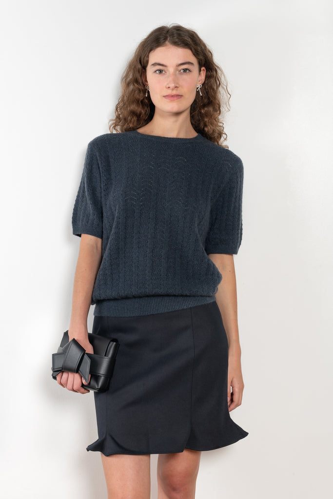 The Cecelia Pointelle Sweater by Lisa Yang is a fine knit cashmere top with a round neck and pointelle detailing