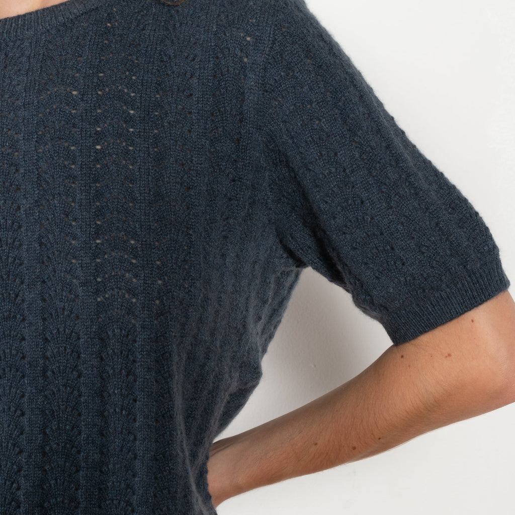 The Cecelia Pointelle Sweater by Lisa Yang is a fine knit cashmere top with a round neck and pointelle detailing