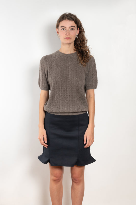 The Cecelia Pointelle Sweater by Lisa Yang is a fine knit cashmere top with a round neck and pointelle detailing