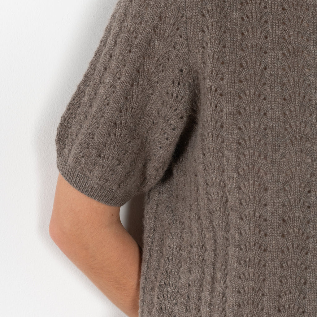 The Cecelia Pointelle Sweater by Lisa Yang is a fine knit cashmere top with a round neck and pointelle detailing