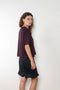 The Cila Tee by LISA YANG is a fine knit cashmere t-shirt with a classic round neck and rolled trim edges