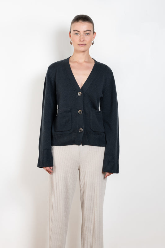 The Danni Cardigan by LISA YANG has extended sleeves for a feminine look, accentuated by patch pockets, ribbed trims and dropped shoulders